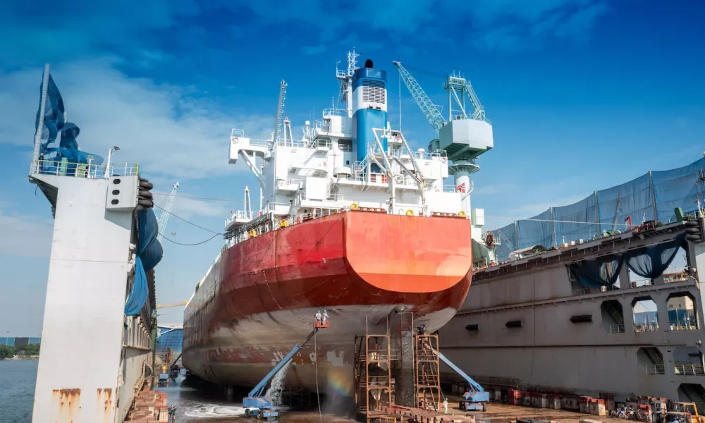The hull painting consists of washing, blasting and painting of the vessel cargo ship by operator at international dry dock
