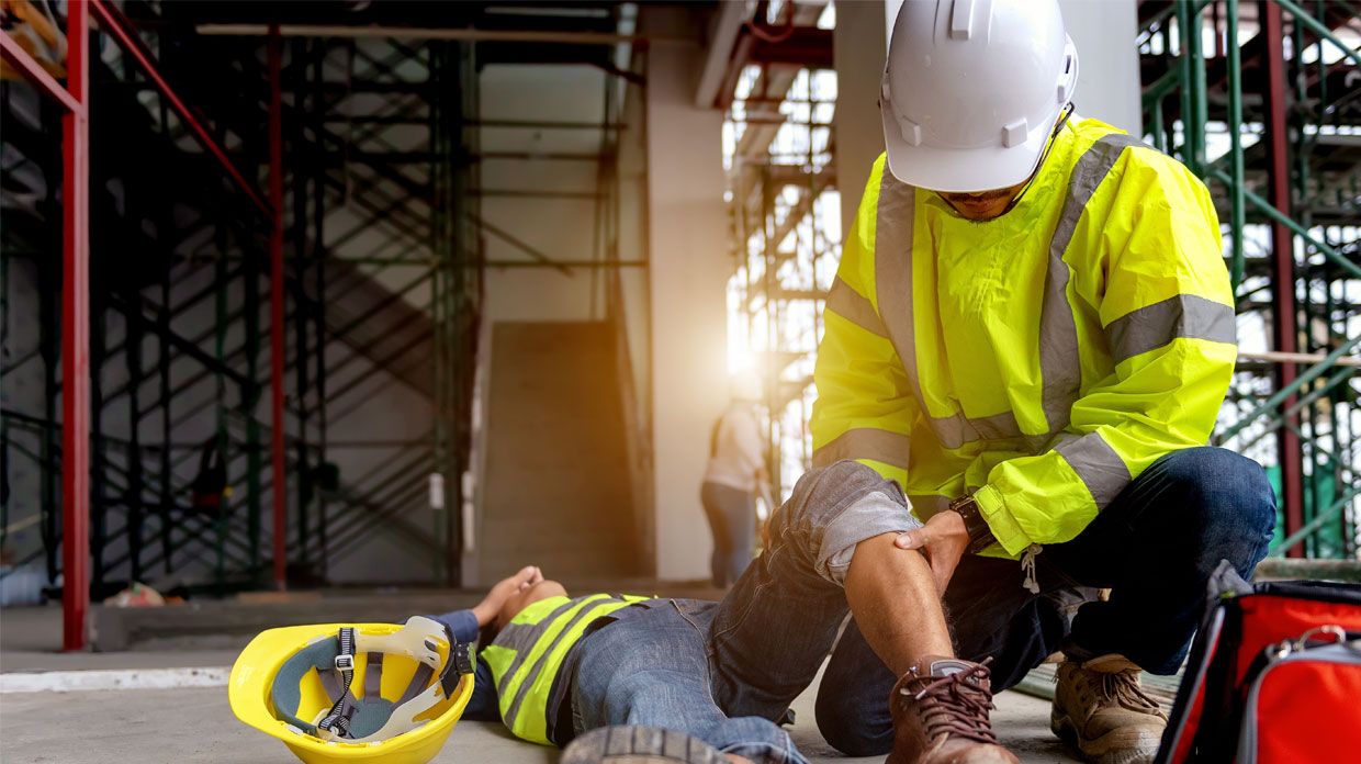 First aid support accident at work of construction worker at site