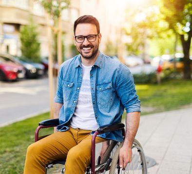 Smiling man in wheelchair