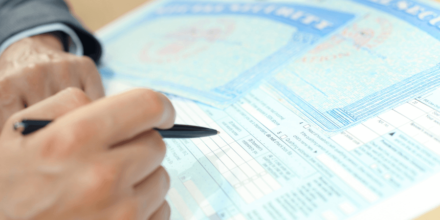 Man filling out social security disability insurance form