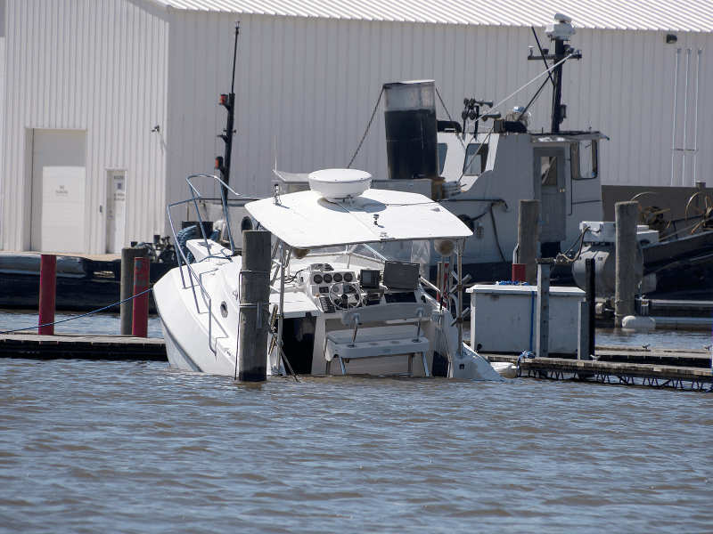 Boat sinking into the harbor
