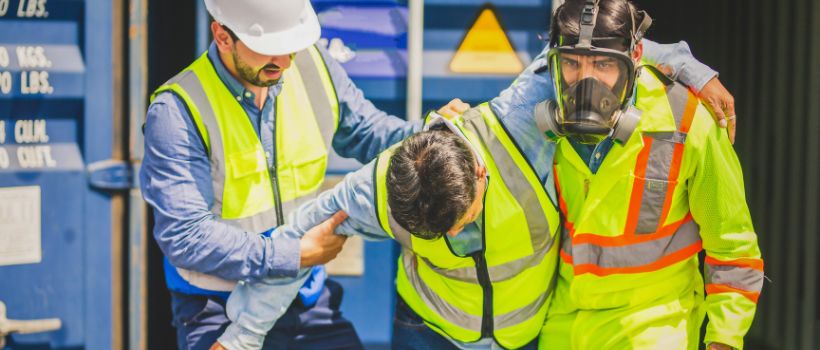 Injured maritime worker being assisted with walking