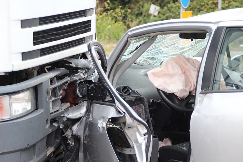 Commercial truck accident with small car and air-bag