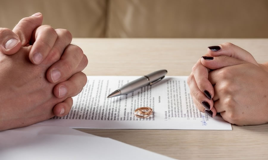 Couple going through paperwork of an uncontested divorce