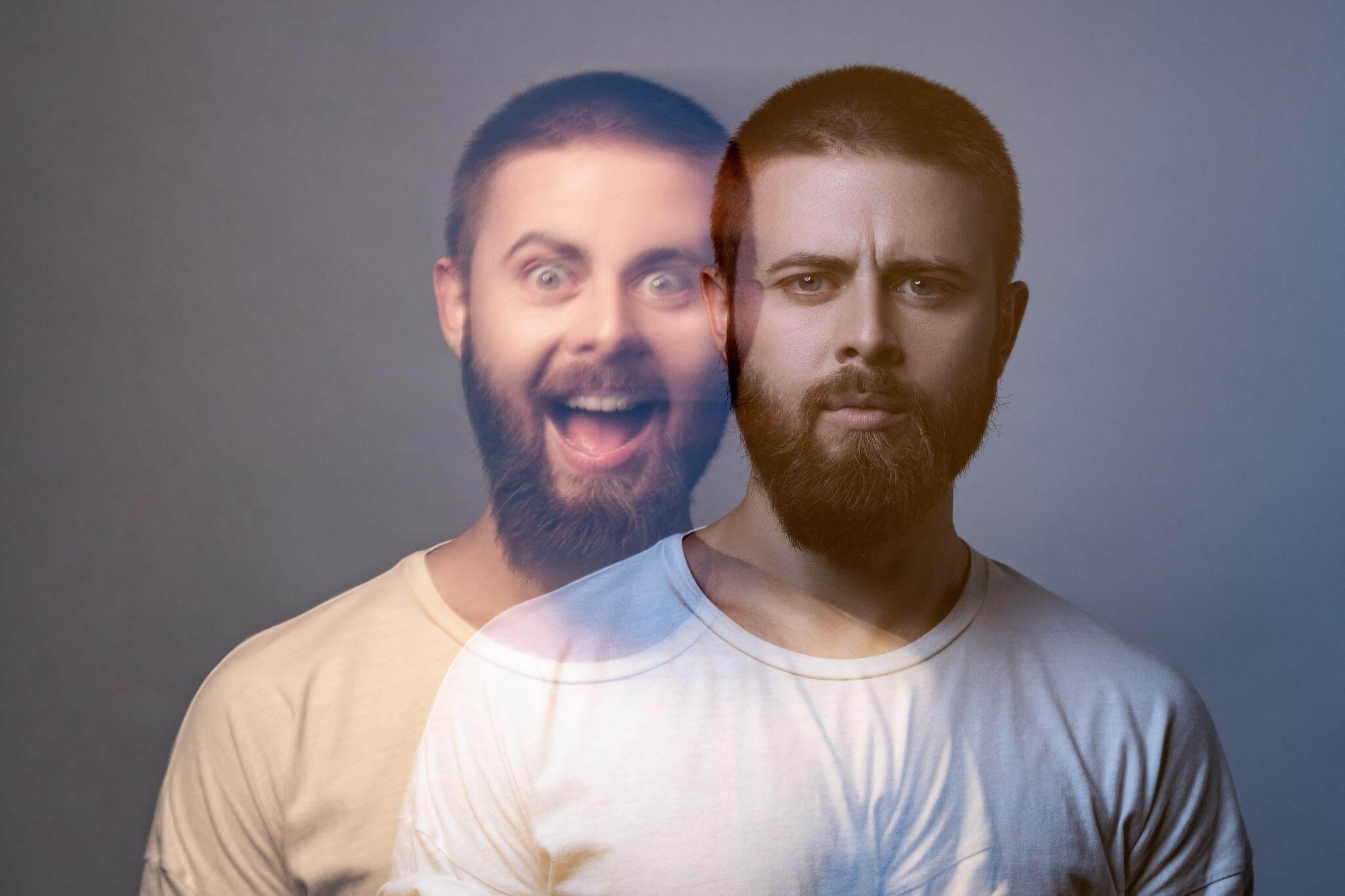 Two bearded men discussing bipolar disorder