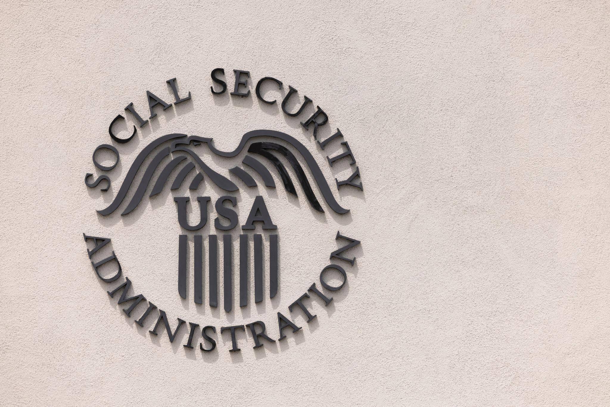Logo of social security bureau on wall